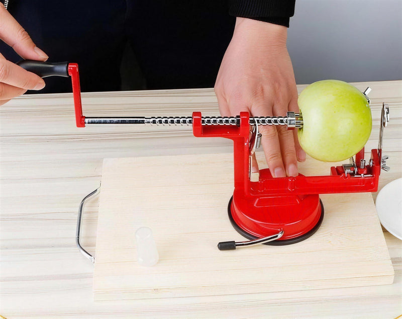 Step 1: push the apple onto the prongs