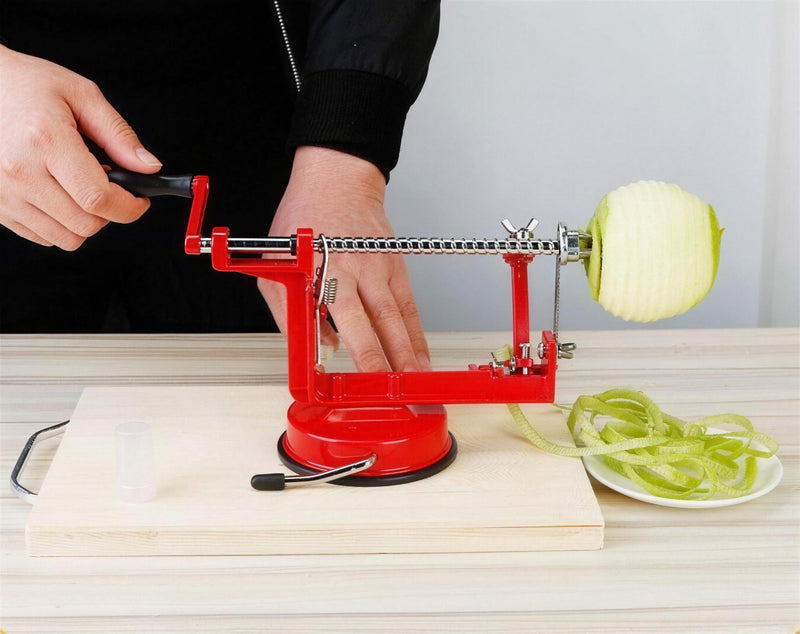 Step 3: the blade peels while the corer and slicer work